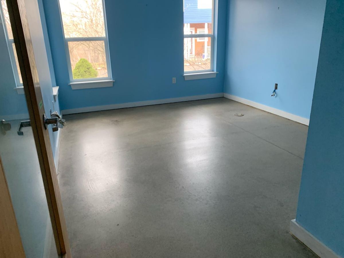 Matte-finish polished concrete floor in a commercial interior