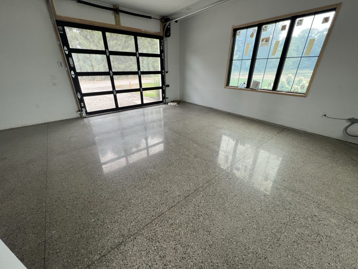 Polished concrete floor with salt-and-pepper aggregate in a Michigan home